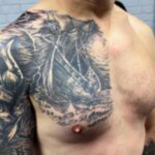 Viking ship tattoo coverup