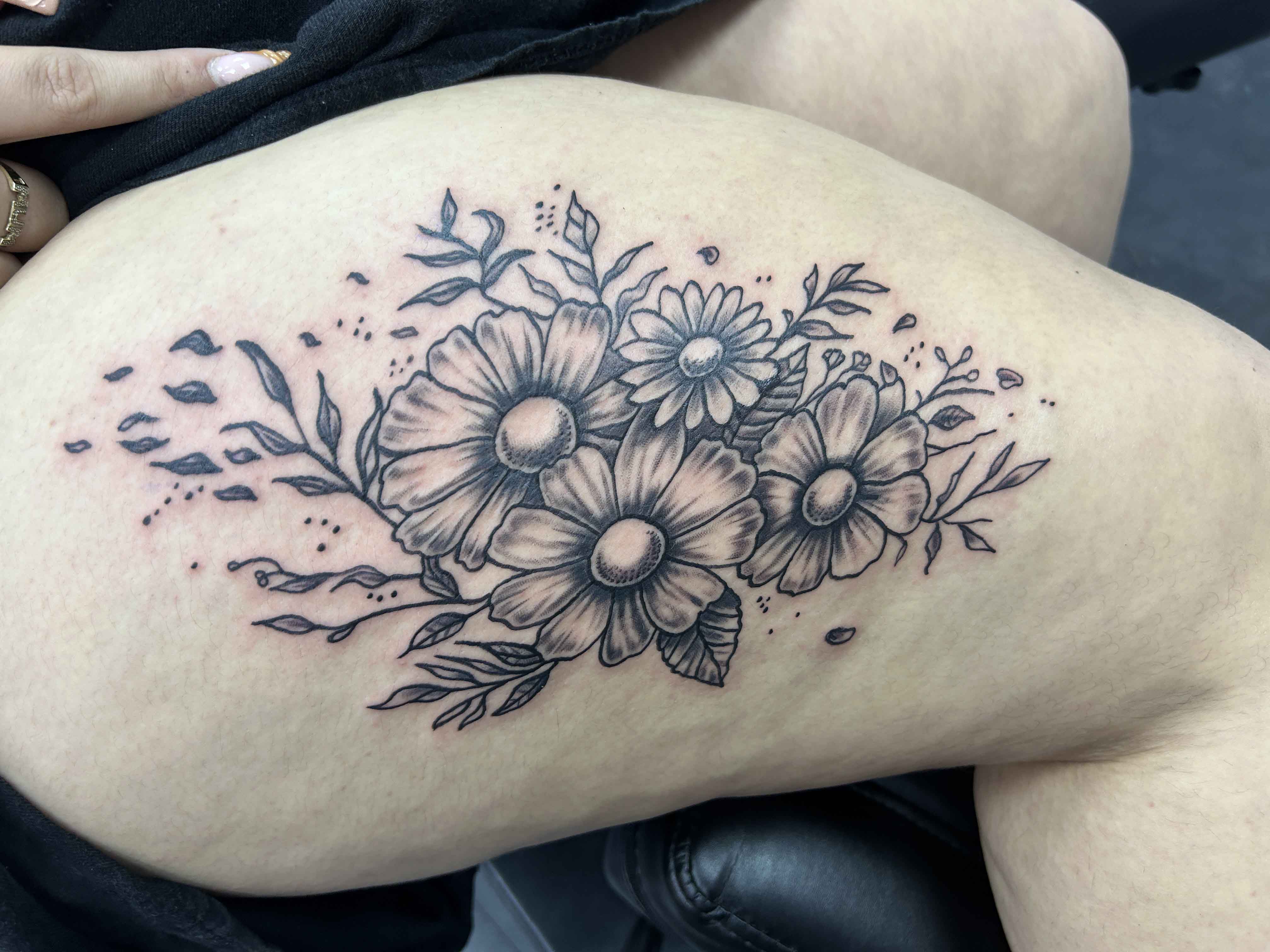Floral thigh piece tattoo