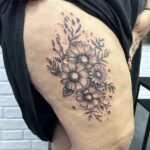Floral thigh piece tattoo