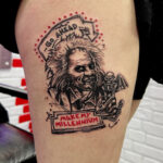 Beetlejuice Tattoo on outer thigh