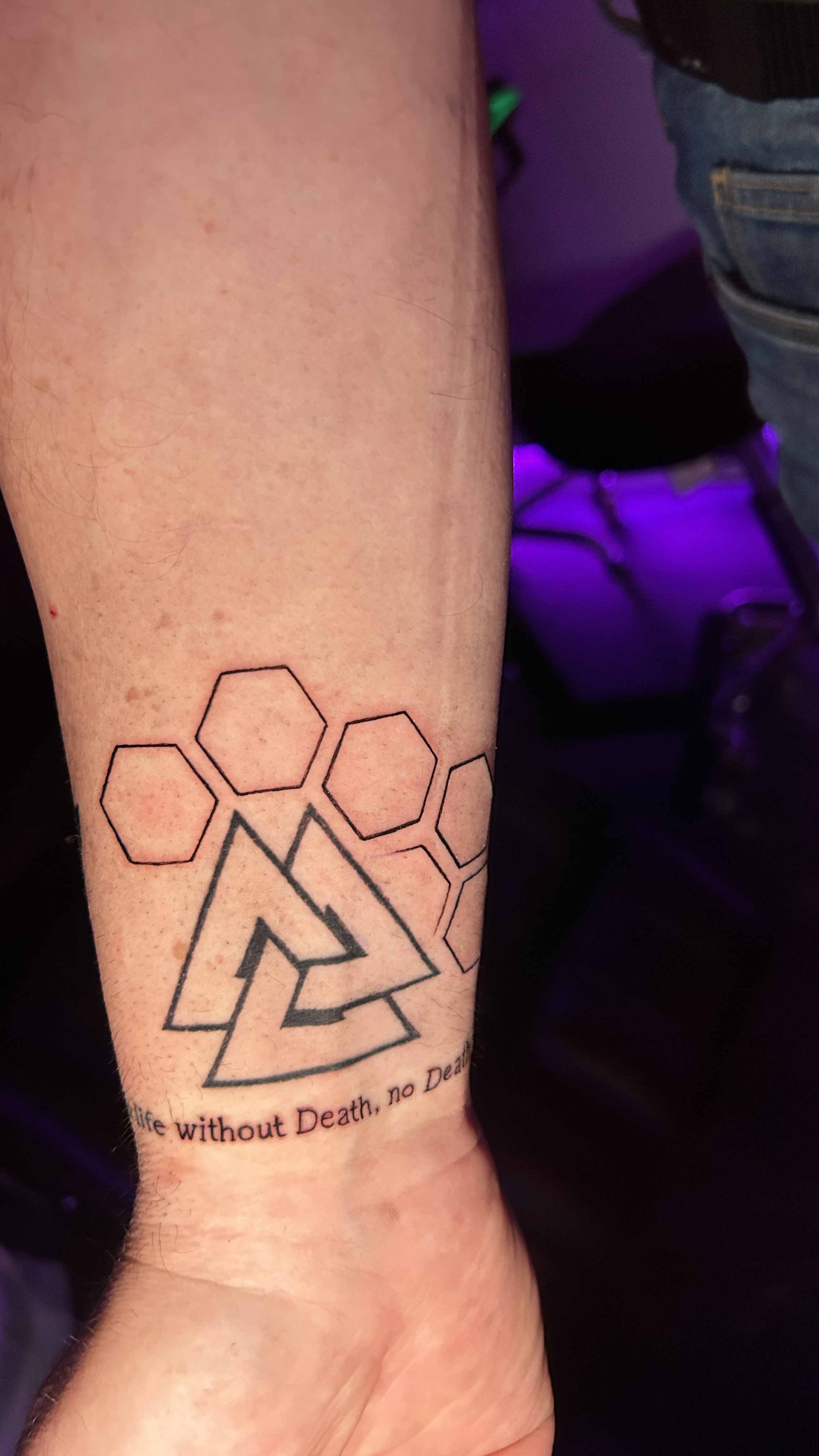 Honeycomb tattoo on wrist