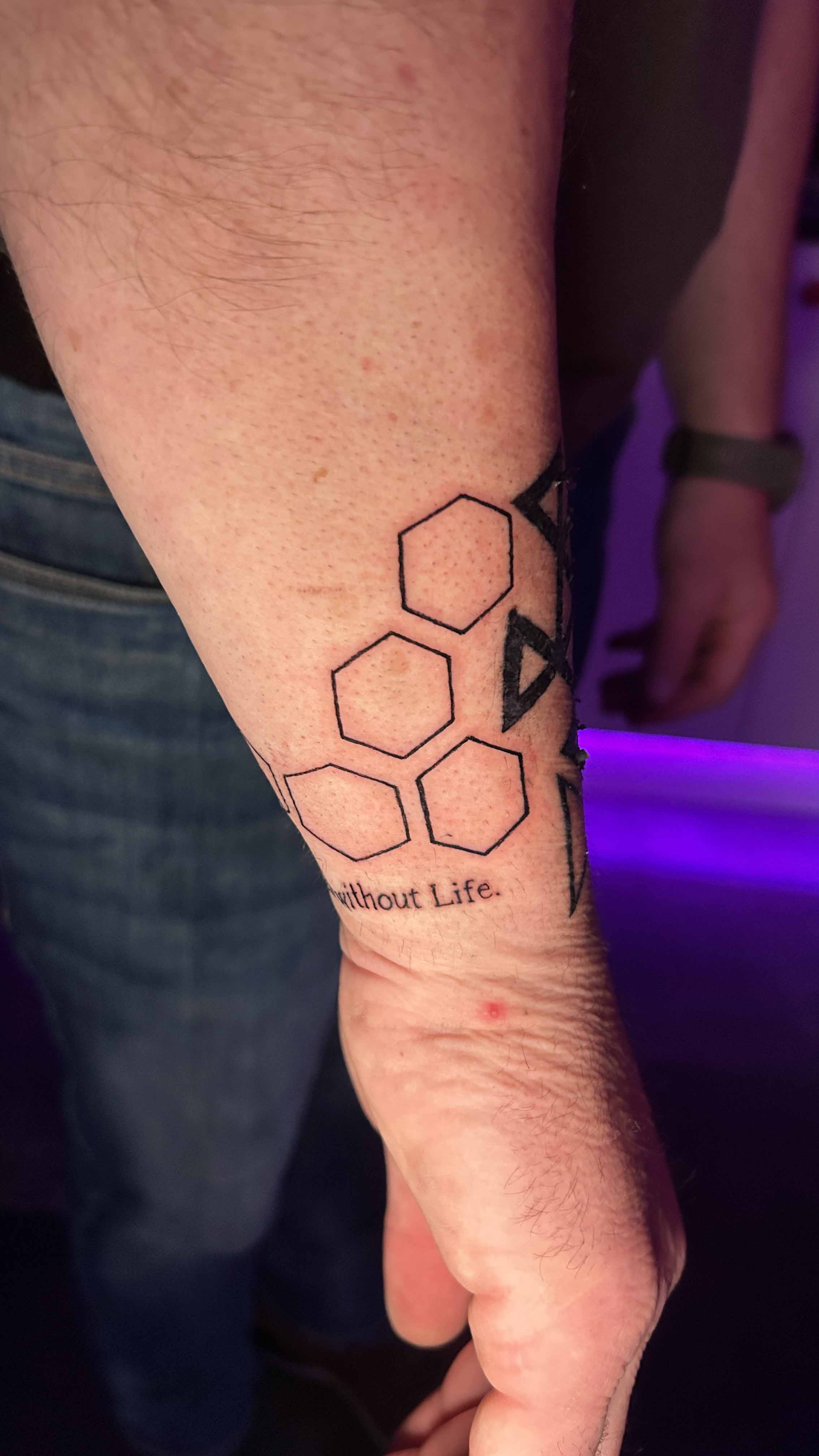 Honeycomb tattoo on wrist