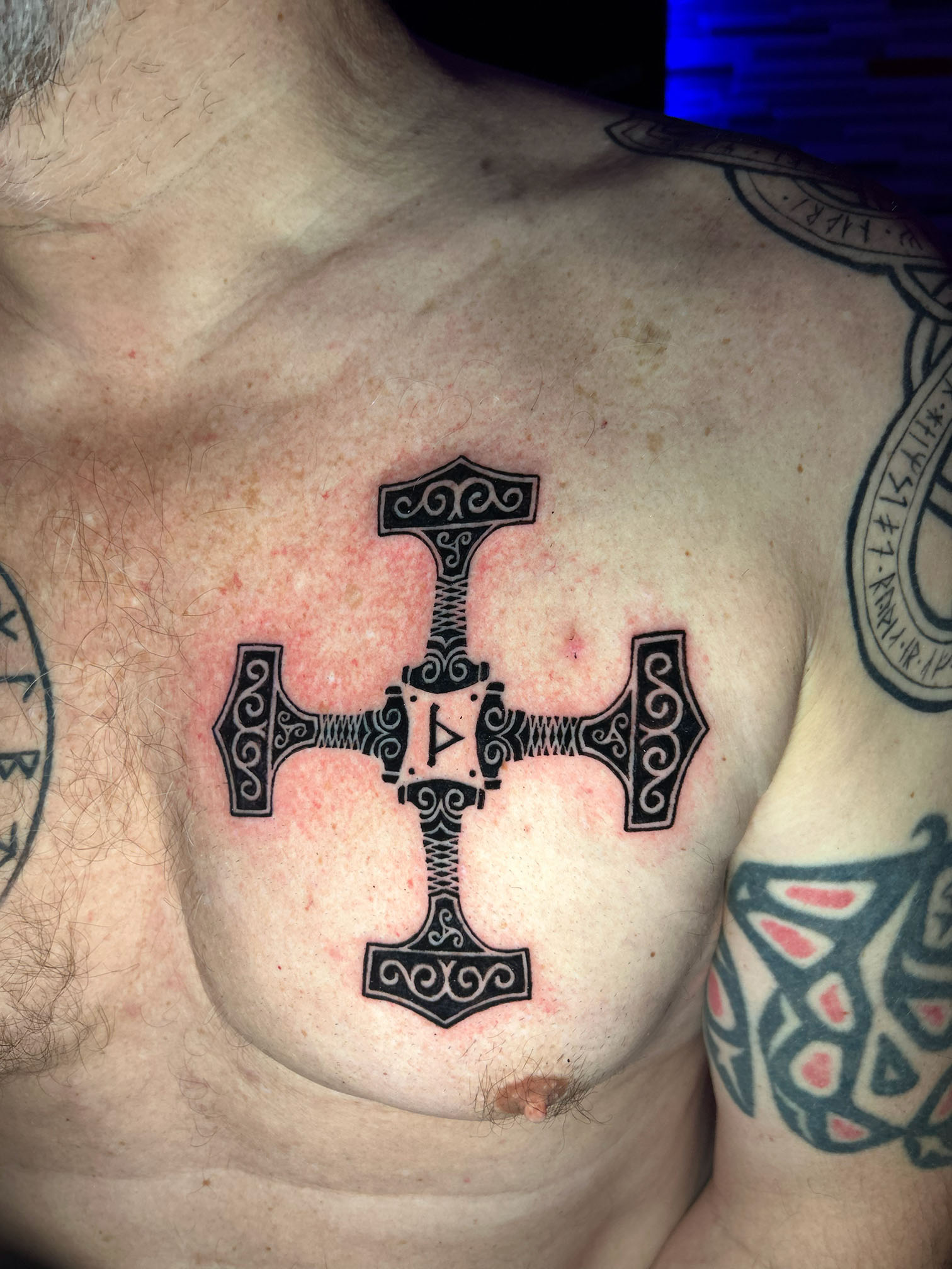 Viking norse style chest tattoo
